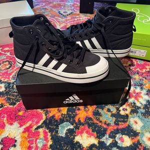 Womens adidas high tops size 9. Worn only a few times